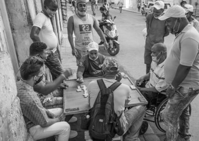 "Habaneiros" – Cuban residents of Havana, play dominoes in the Habana Centro neighborhood of the capital. © 2022 John D. Elliott • www.TheHumanPulse.com